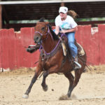 Girl racing a horse